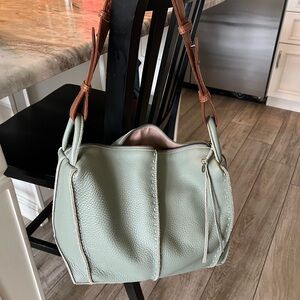 The Sak.  Green and Brown Leather Shoulder Bag with Spacious Design